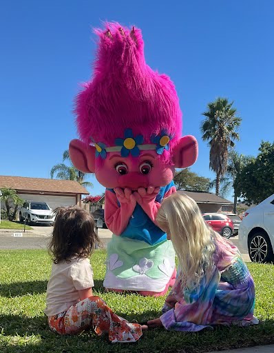 Hire Poppy from Trolls for birthday parties - colorful mascot character performer in Chicago